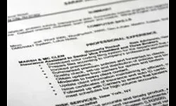 Lifetime Updates Close-up of a printed resume showing sections for summary, computer skills, and professional experience.