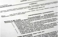 Lifetime Updates Close-up of a printed resume showing sections for summary, computer skills, and professional experience.